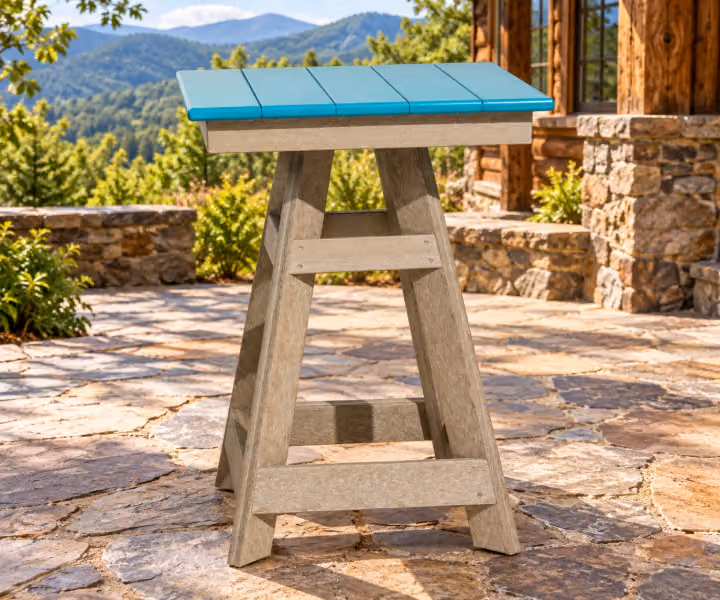Willow Bay Poly Balcony Table in an outdoor mountain cabin setting