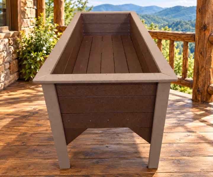 Willow Bay Poly Raised Garden Box in an outdoor mountain cabin setting