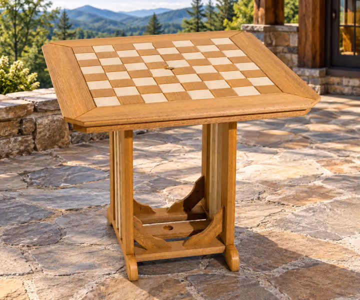 Willow Bay Poly Checkerboard Table in an outdoor mountain cabin setting