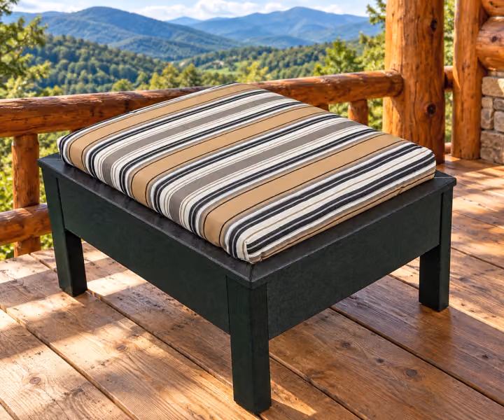 Willow Bay Poly Cushioned Ottoman in an outdoor mountain cabin setting