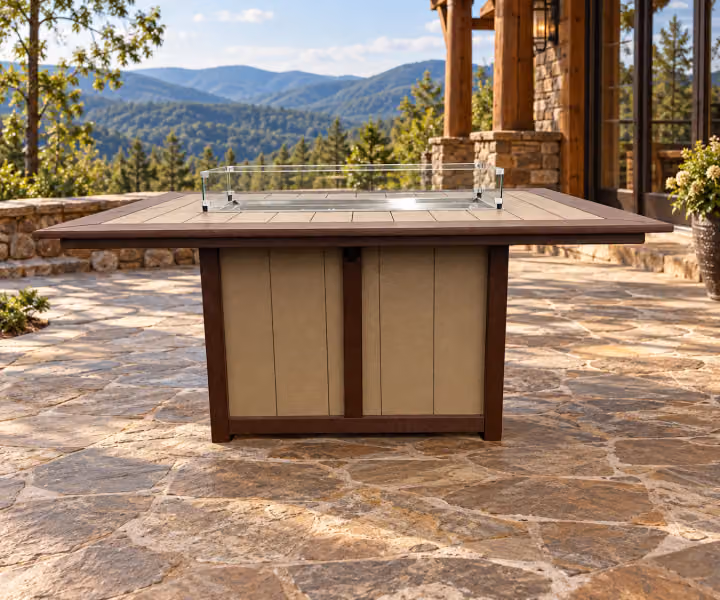 Willow Bay Poly Rectangular Dining Fire Table in an outdoor mountain cabin setting