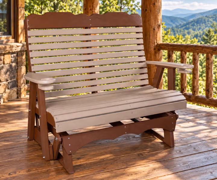 Willow Bay Poly Tall-back Glider on a covered mountain cabin porch