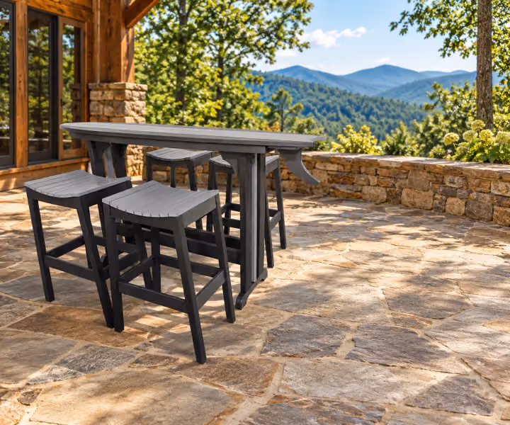 Willow Bay Poly Surfboard Table in an outdoor mountain cabin setting