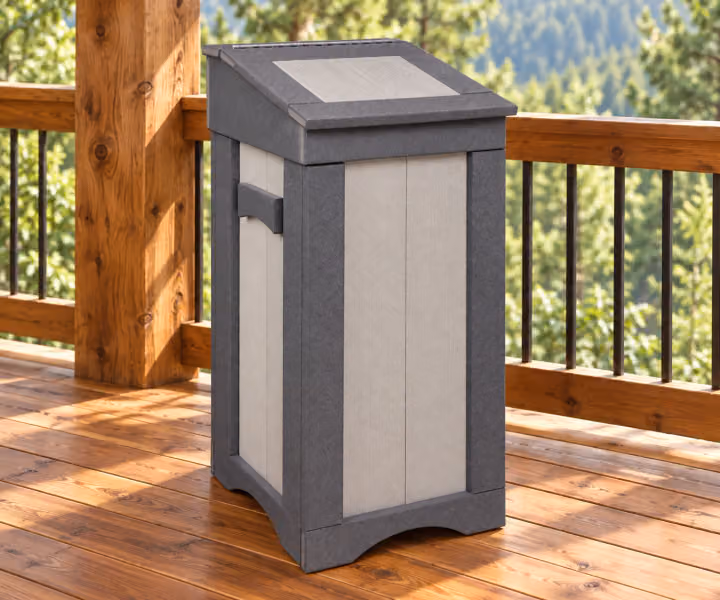 Harbor Porch Poly Flip-top Waste Bin in an outdoor cabin setting