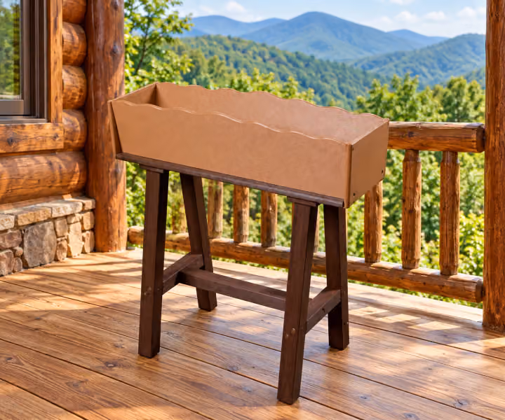 Willow Bay Poly Raised Flower Planter in an outdoor mountain cabin setting