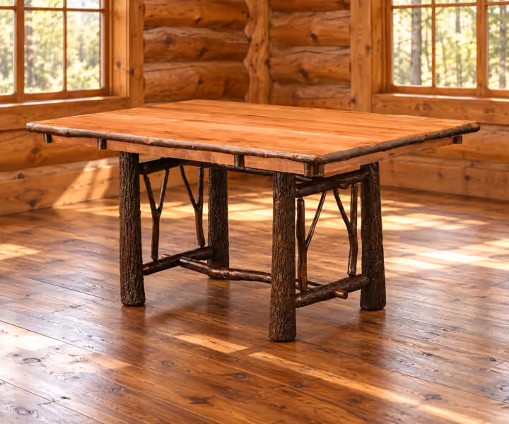 Fox Hollow Hickory Branch Trestle Dining Table in a rustic cabin dining