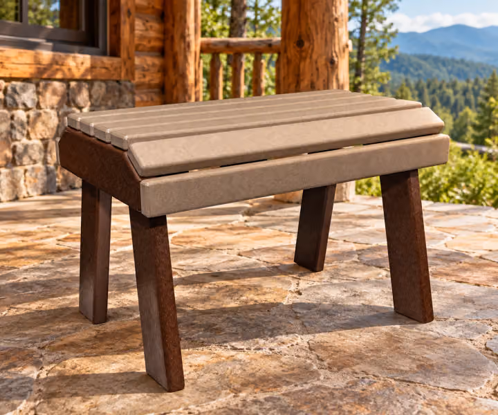 Willow Bay Poly Flat Top Footrest Jr in an outdoor mountain cabin setting