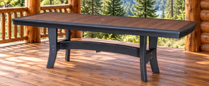 Harbor Porch Long Bordered Poly Dining Table in an outdoor cabin setting