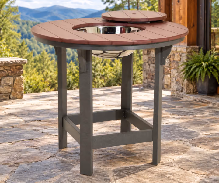 Willow Bay Poly Round Party Table in an outdoor mountain cabin setting