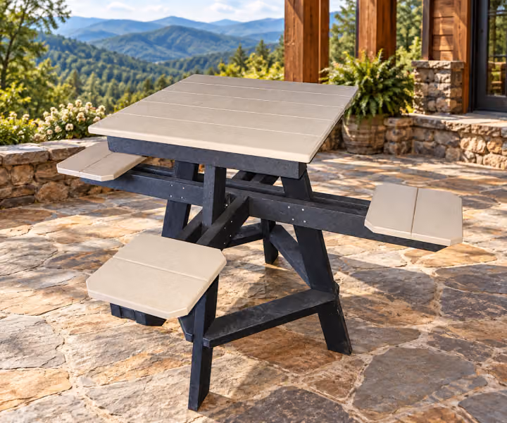 Willow Bay Poly Four-Way Picnic Table in an outdoor mountain cabin setting