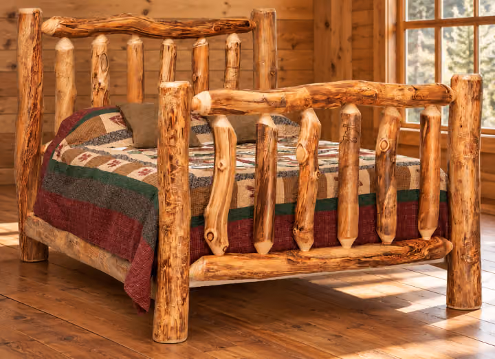 Timber Hollow Aspen Extra-High Spindle Bed in a cabin bedroom