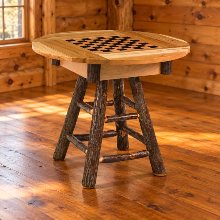 Fox Hollow Hickory Gamekeeper Round Game Table in a rustic cabin dining