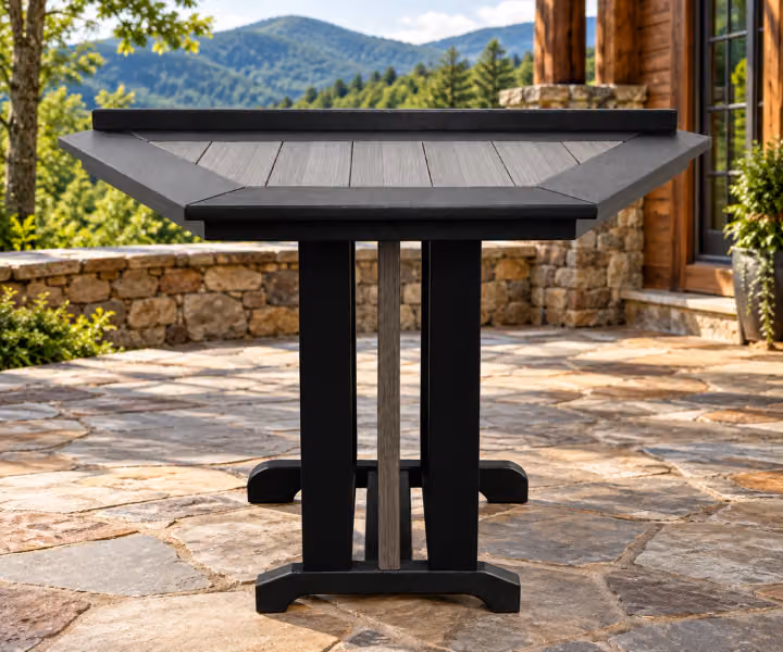 Willow Bay Poly Compact Wedge Mission Table in an outdoor mountain cabin setting