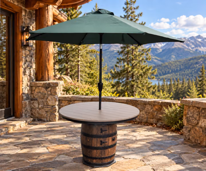 Caskwood Outdoor Poly-Top Whiskey Barrel Table in a rustic cabin