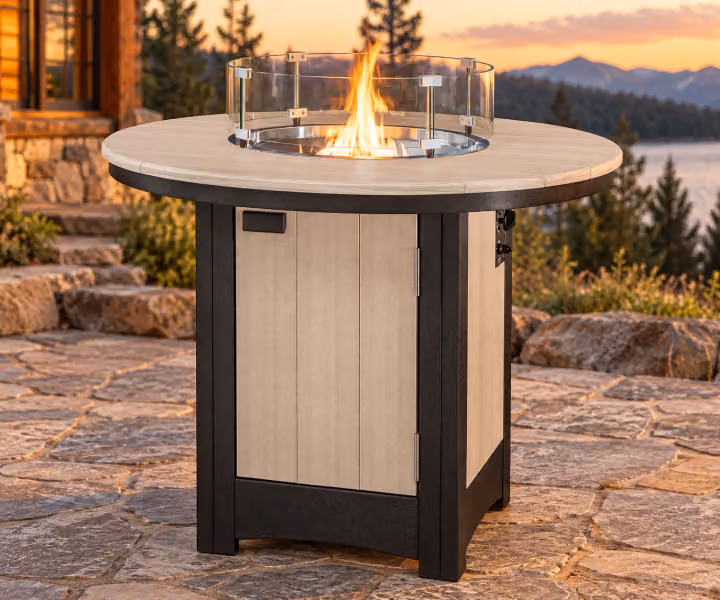 Harbor Porch Round Poly Counter Fire Table in an outdoor cabin setting