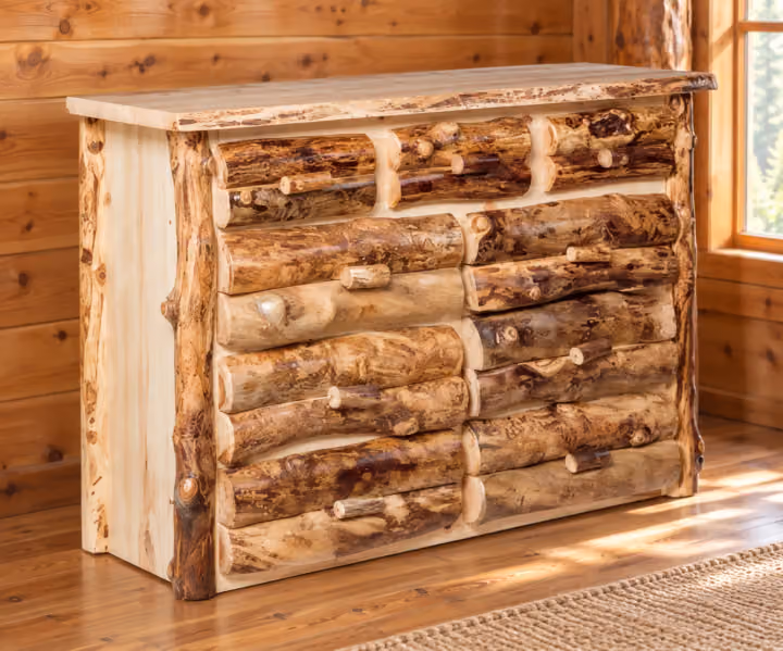 Clearwater Aspen Nine Drawer Dresser in a rustic cabin bedroom