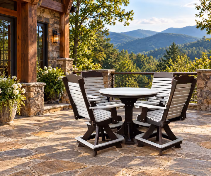 Willow Bay Poly Round Pedestal Table in an outdoor mountain cabin setting