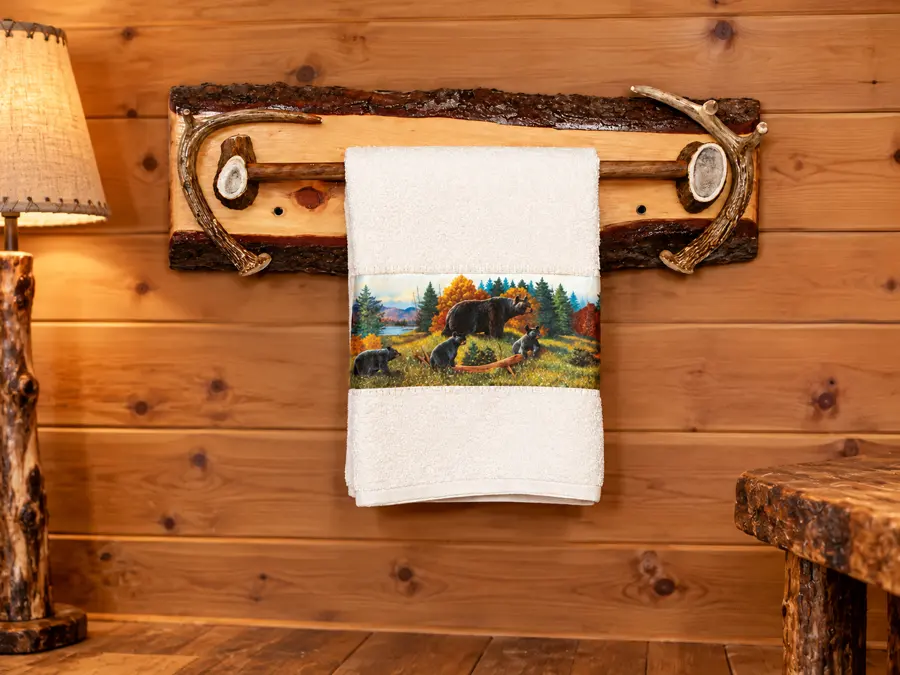 Woodland Slab Antler Towel Rack in a rustic cabin