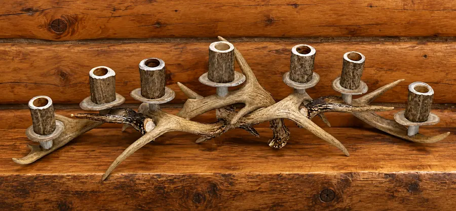 Whitetail Seven-Candle Mantelpiece in a rustic cabin