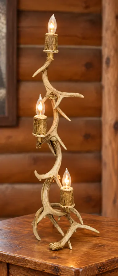 Whitetail Three-Light Tower Lamp in a rustic cabin