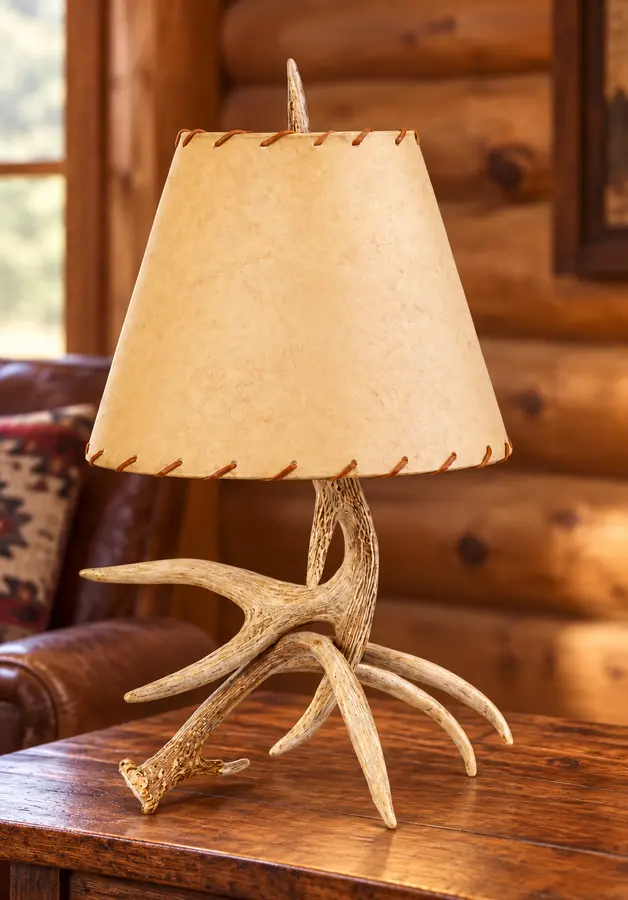 Woodland Two-Antler Table Lamp in a rustic cabin