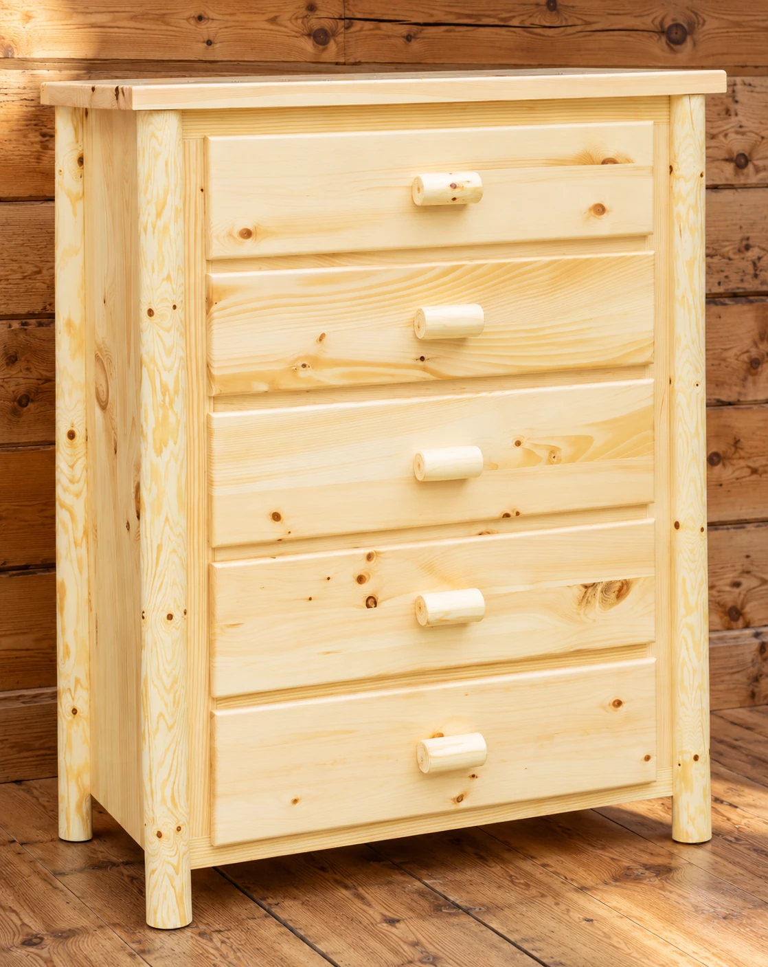 Timber Hollow Plain Pine Flat-Front Five-Drawer Chest in a cabin bedroom