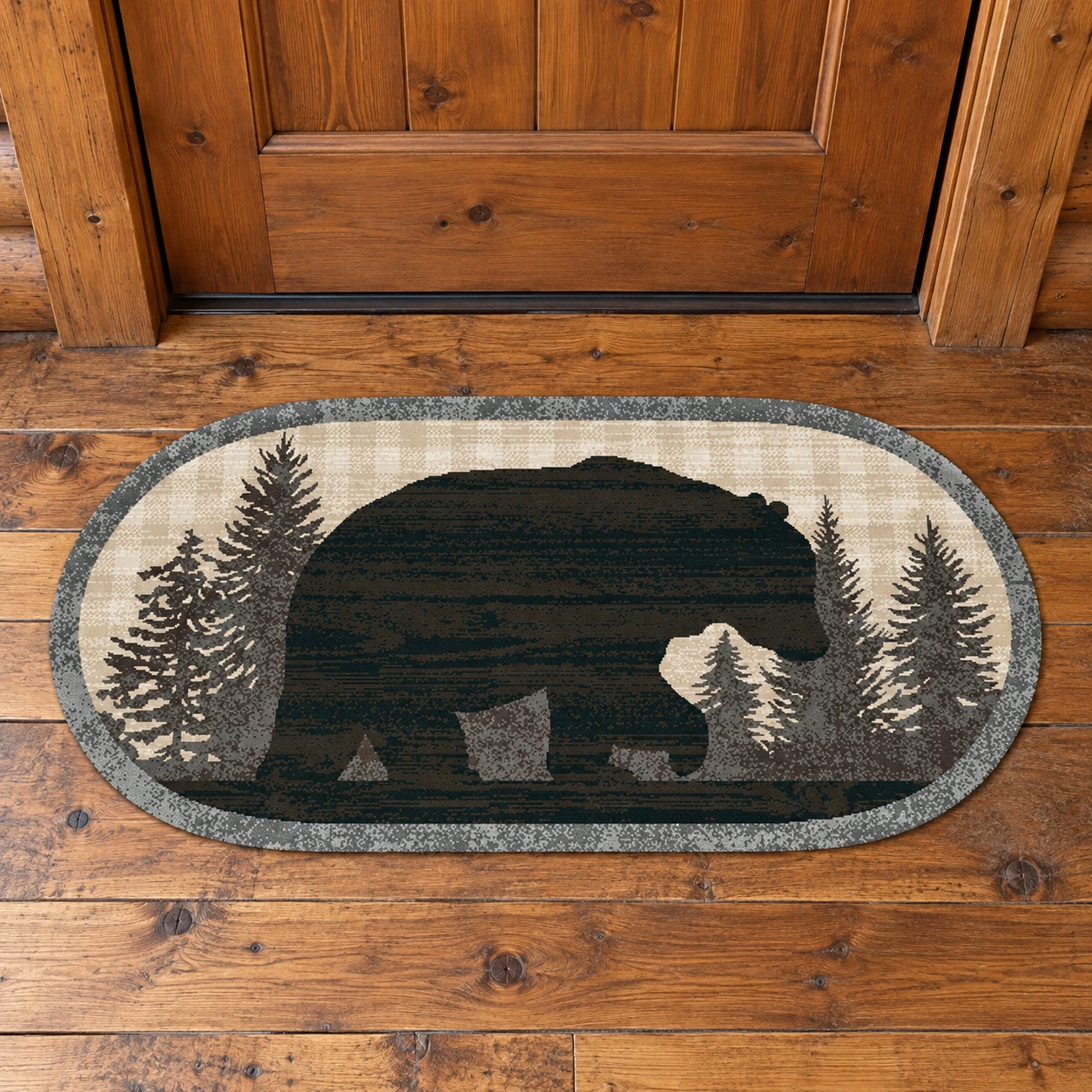 Forest Sentinel Bear Oval Entry Rug in a rustic cabin